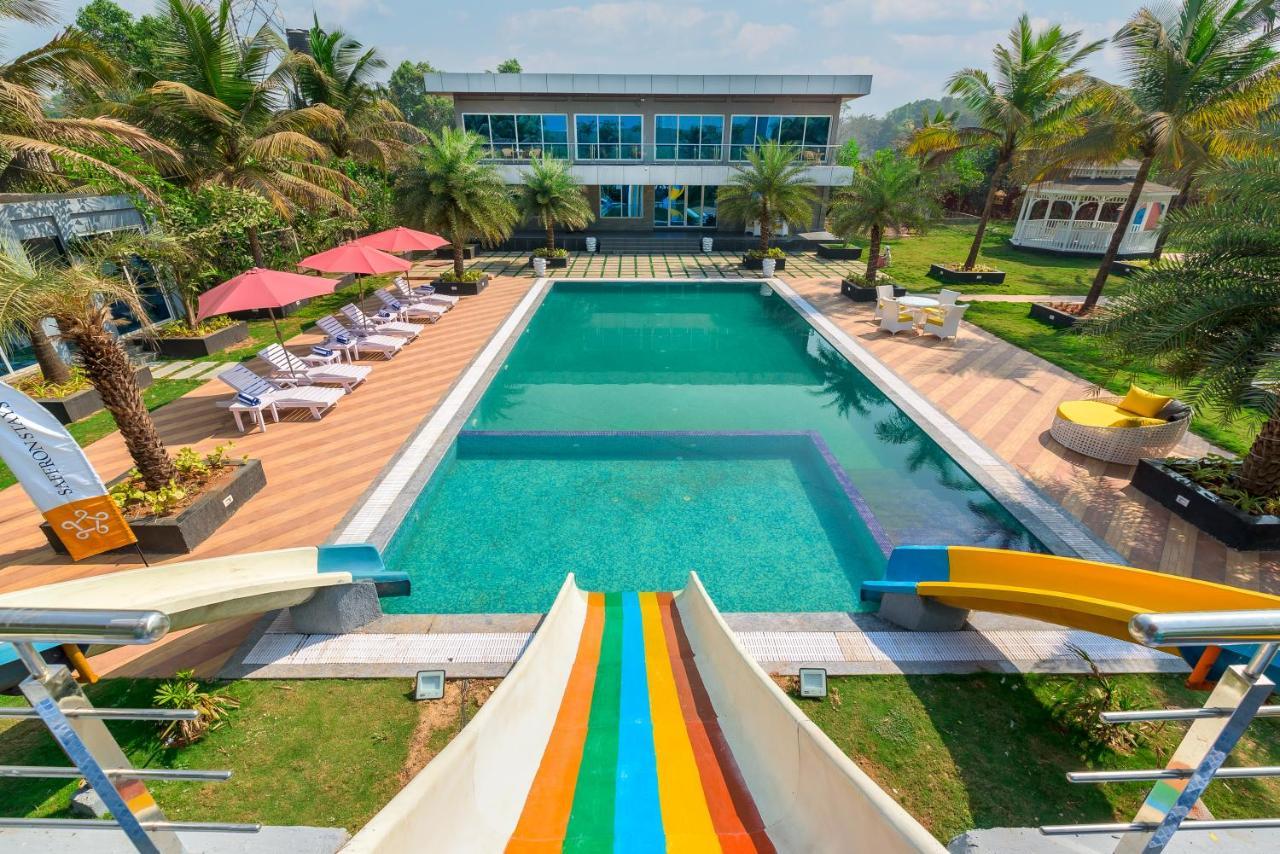 Saffronstays Palm Paradise: Poolside Oasis with Slides and Games Padghe Exterior photo